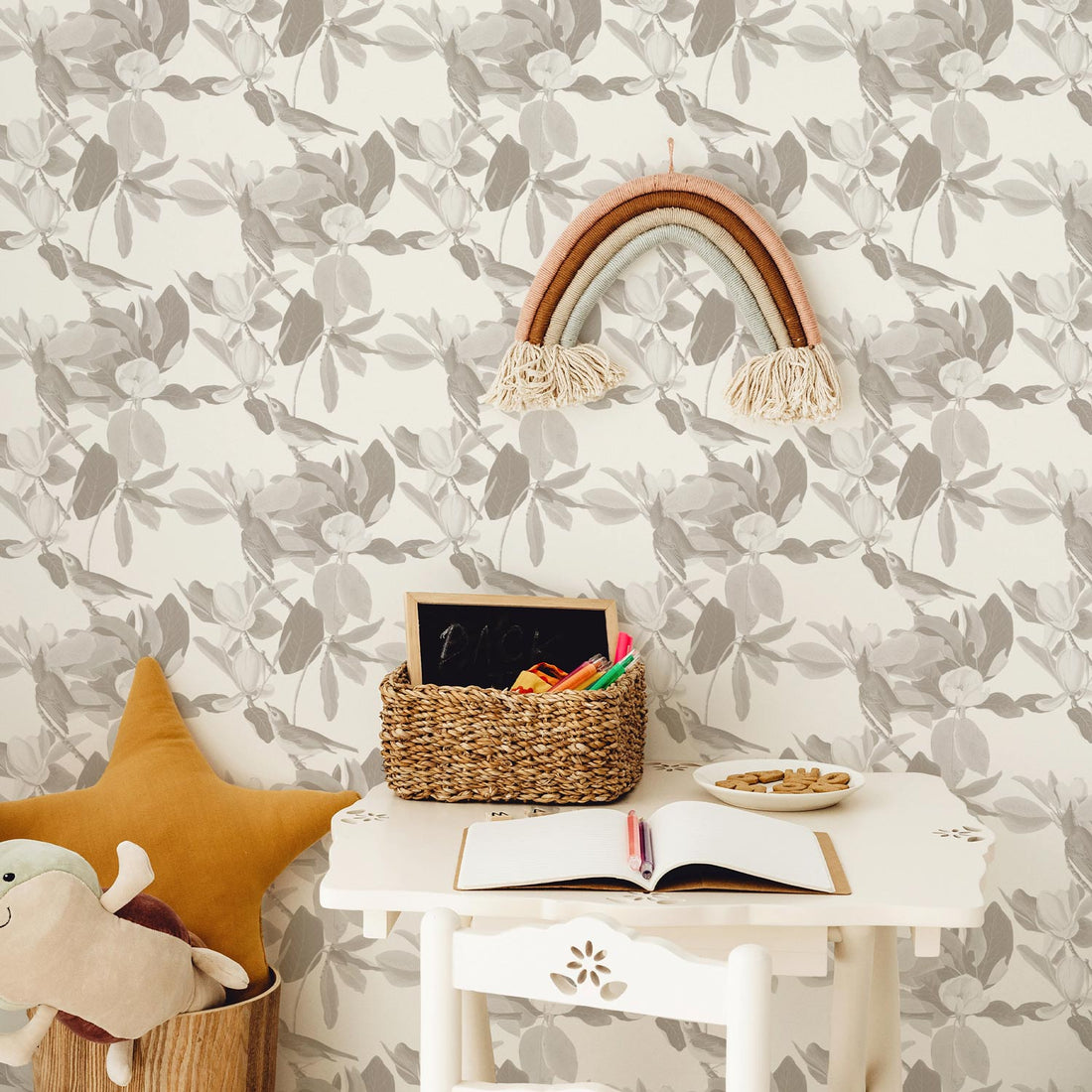 Vintage floral garden wallpaper in neutral colors in bohemian kids room interior