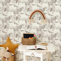 Vintage floral garden wallpaper in neutral colors in bohemian kids room interior