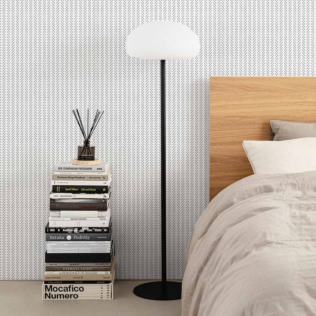 classic black and white wallpaper in modern bedroom
