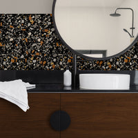 dark and elegant bathroom interior with peel and stick backsplash in stone