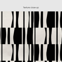 Black and cream silk wallpaper with abstract wavy geometric tile pattern
