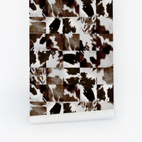 Dark brown and white cowhide patchwork mosaic pattern peel and stick wallpaper