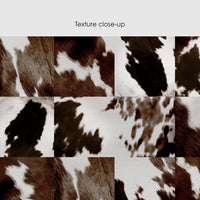 Brown and white peel and stick wallpaper with a cow print mosaic tile pattern