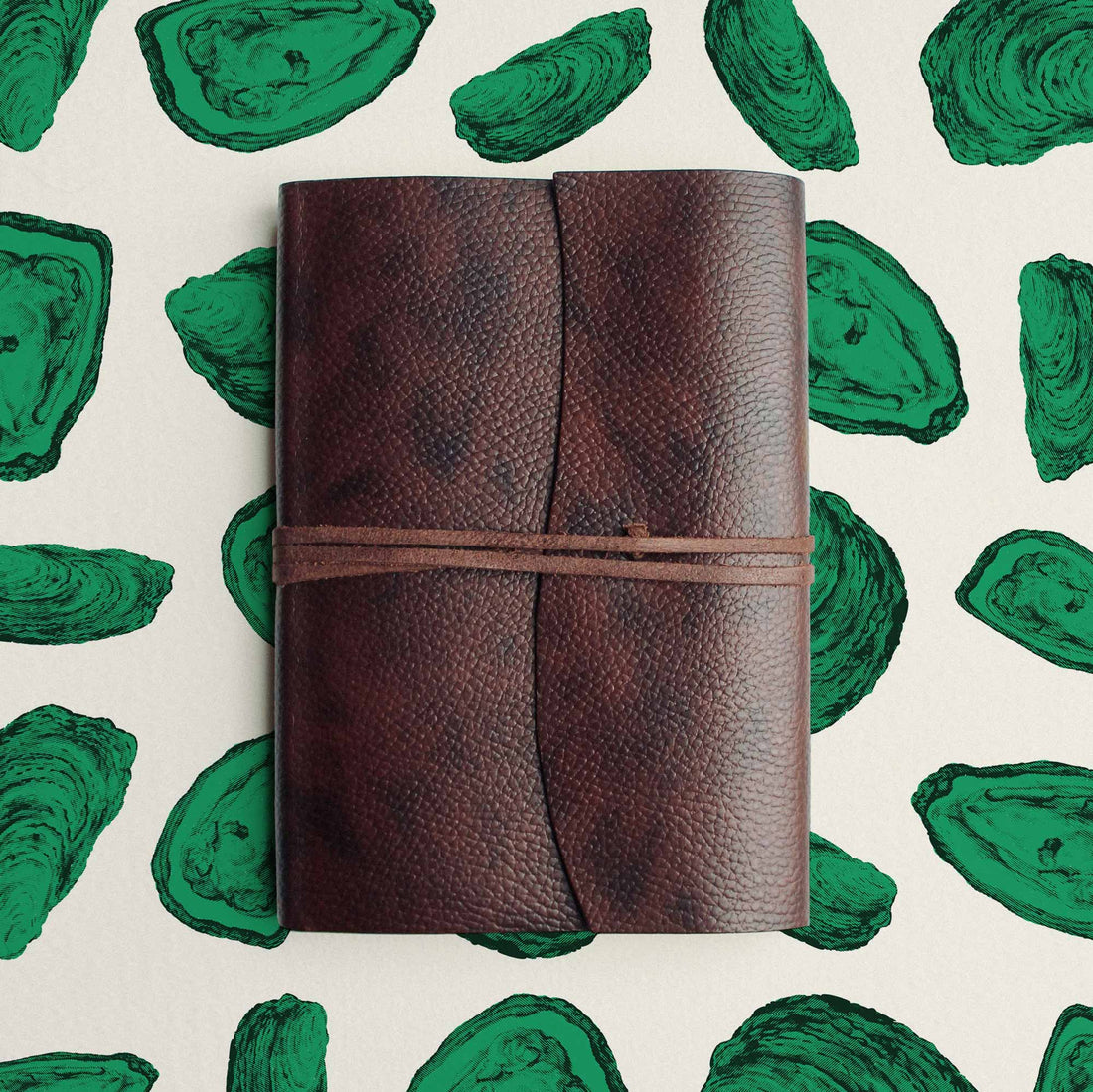 eclectic oyster print wallpaper design in green