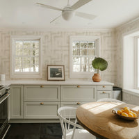 Neutral beige geometric wallpaper with winding maze-like line pattern