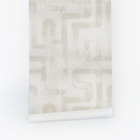 Cream and taupe abstract wallpaper with bold brushstroke line pattern