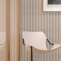 Beige and cream striped wallpaper with soft neutral vertical pinstripe pattern