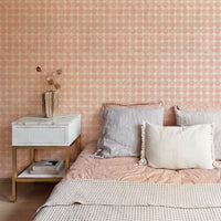 Pastel pink retro bedroom wallpaper with a dotted circle geometric pattern