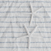 light blue coastal fabric with tiny dots