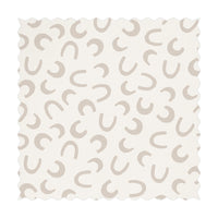 beige color fabric with tiny horseshoe prints