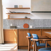 black and white simple vinyl peel and stick backsplash in brown kitchen