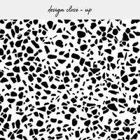 black and white peel and stick stone inspired backsplash