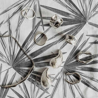 classy fabric design with black and white palm leaves