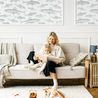 soft blue fish pattern wallpaper for coastal style kids room interior