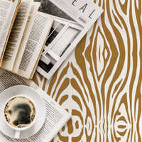 tiger print wallpaper in bright faux gold color