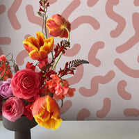 cute shapes wallpaper design in pastel pink colors