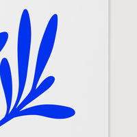 close up of bright blue leaves print