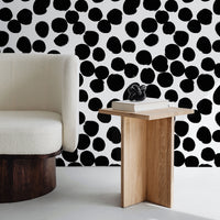 large spots wallpaper in black and white
