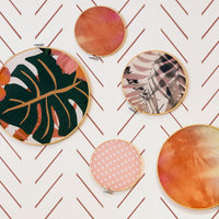 Modern herringbone design removable wallpaper in terracotta color in bohemian nursery interior