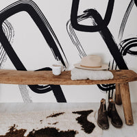 Black and white wall mural in boho farmhouse interior