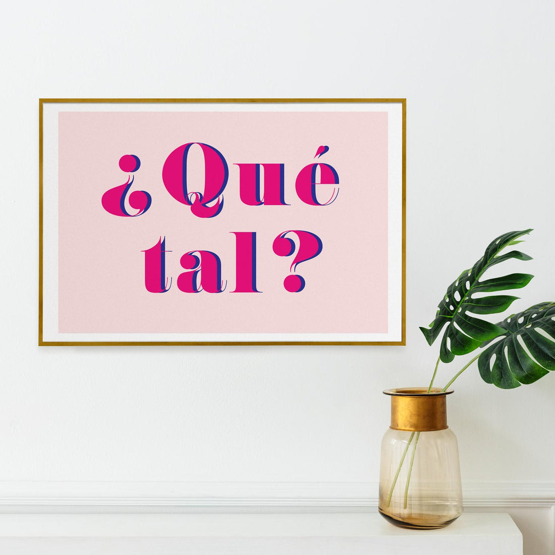 eclectic gallery wall in living room interior with spanish saying