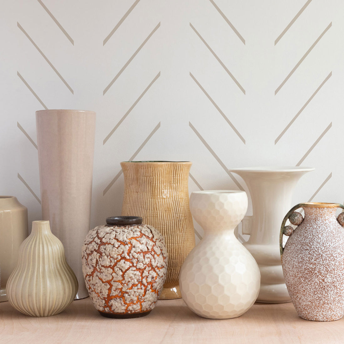 beige simple stripe wallpaper together with beautiful vases