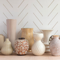 beige simple stripe wallpaper together with beautiful vases