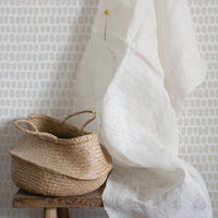 small paintbrush dots in neutral color wallpaper design