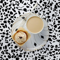 granny chic kitchen design with black terrazzo wallpaper