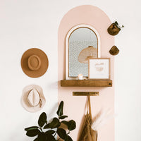 bohemian entryway with grey small dots print wallpaper