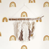 minimal bohemian style decor with tiny rainbow print wallpaper