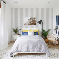 white bedroom interior for boys with abstract chevron pattern wallpaper