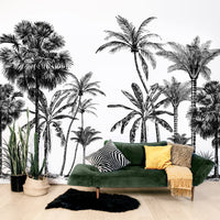 Modern jungle wall mural in tropical boho living room interior