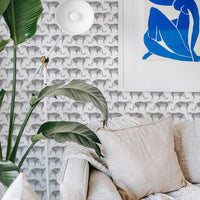 modern bohemian style living room interior with cheetah print wallpaper