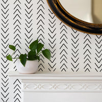 modern scandinavian chic style living room interior with chevron print wallpaper