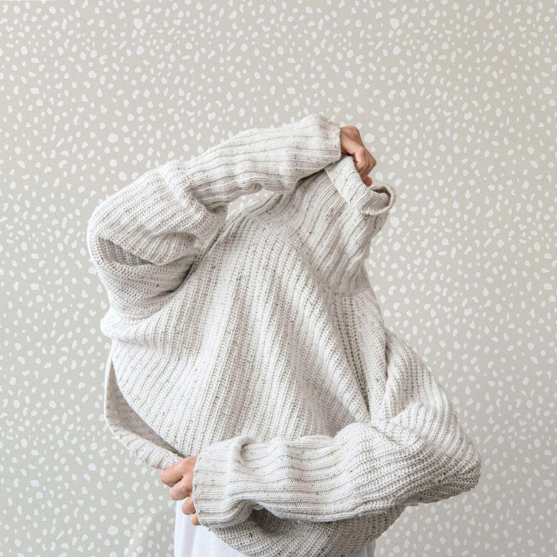 small animal print neutral peel and stick wallpaper