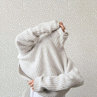 small animal print neutral peel and stick wallpaper