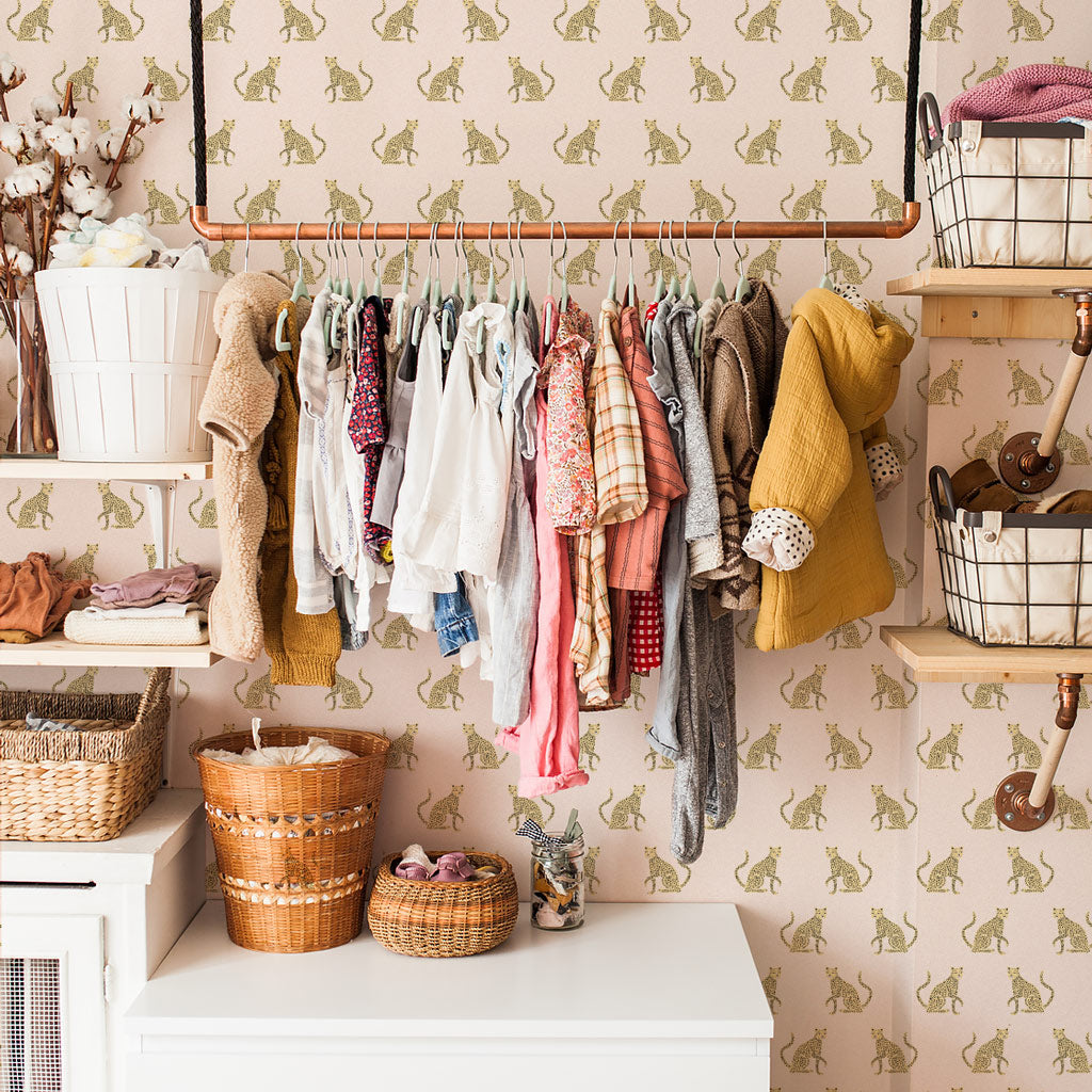 pink bohemian girls nursery interior with pink leopard print animal removable wallpaper
