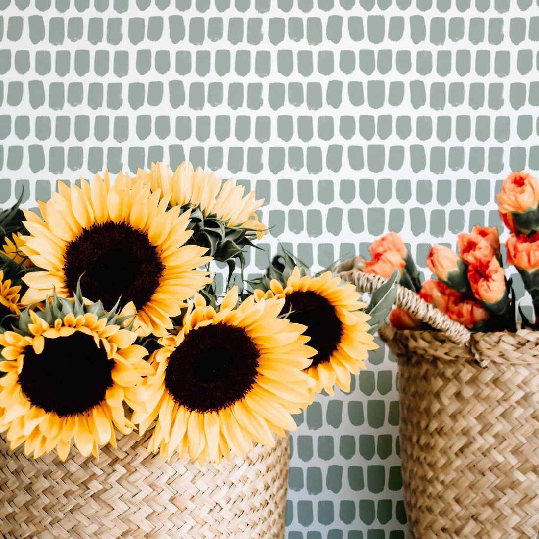 Sage green brush stroke design removable wallpaper in boho interior setting