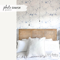 soft blue tropical guest bedroom wallpaper with palm leaves pattern