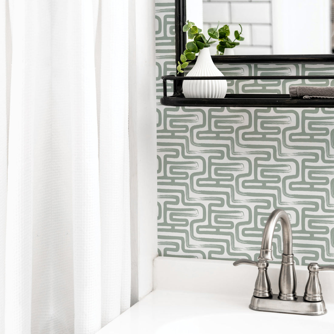 Sage green brush stroke design wallpaper in bathroom interior