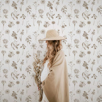 country house inspired floral wallpaper design in beige