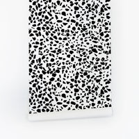 black and white terrazzo inspired peel and stick wallpaper