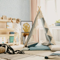 fun playroom interior with blue speckle pattern wallpaper peel and stick