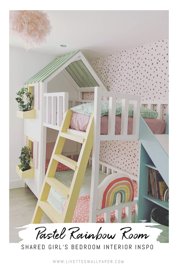 Rainbow themed shared girl's room interior with pink removable wallpaper and rainbow wall mural