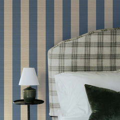 Oversized navy blue and tan vertical striped grasscloth wallpaper