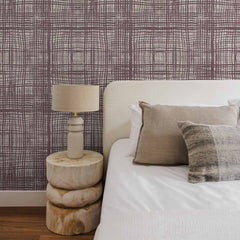 Mauve wallpaper with dark purple crosshatch plaid pattern