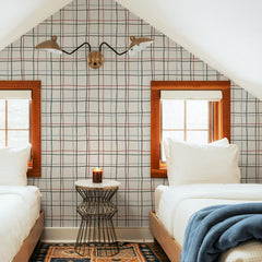Cream plaid wallpaper with hand-drawn black and red windowpane lines