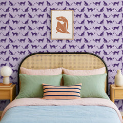 Lavender wallpaper with a repeating purple cat silhouette pattern