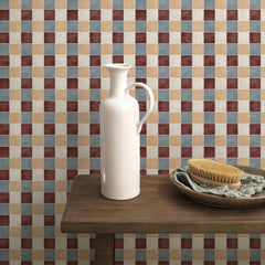 Retro mosaic-tile wallpaper with maroon, tan, and blue-gray checkerboard squares